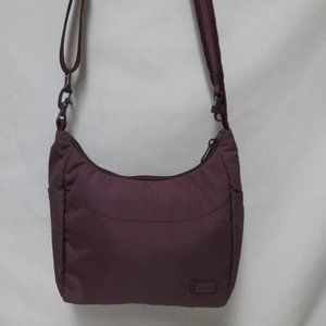 Pacsafe travel crossbody shoulder bag purse RFID blocking adjustable zip top
